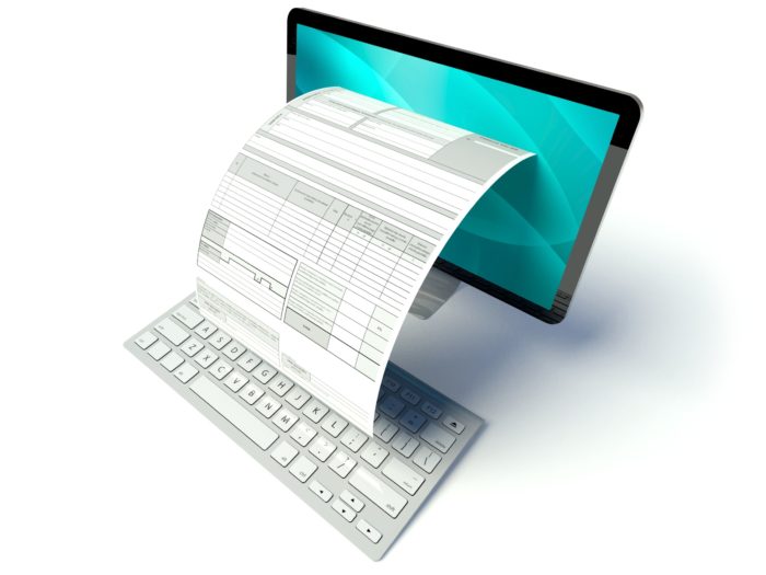 Desktop computer screen with tax form or invoice